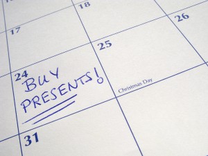 Buy presents written on a calendar on the 24th December Christmas Eve.