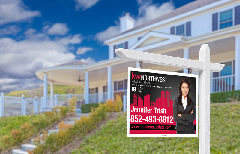 A vibrant Keller Williams sign in a well-kept yard