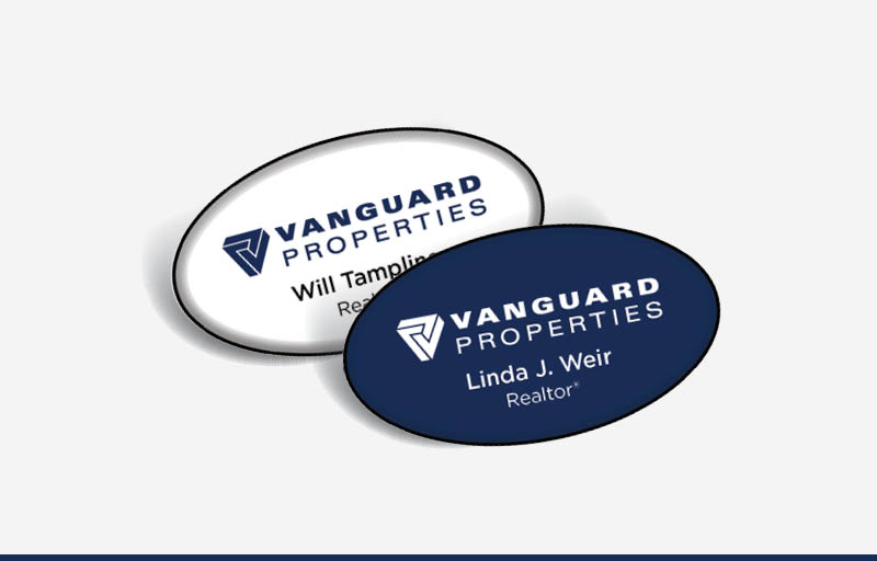 Vanguard Properties Real Estate Domed Oval Name Badge | BestPrintBuy.com